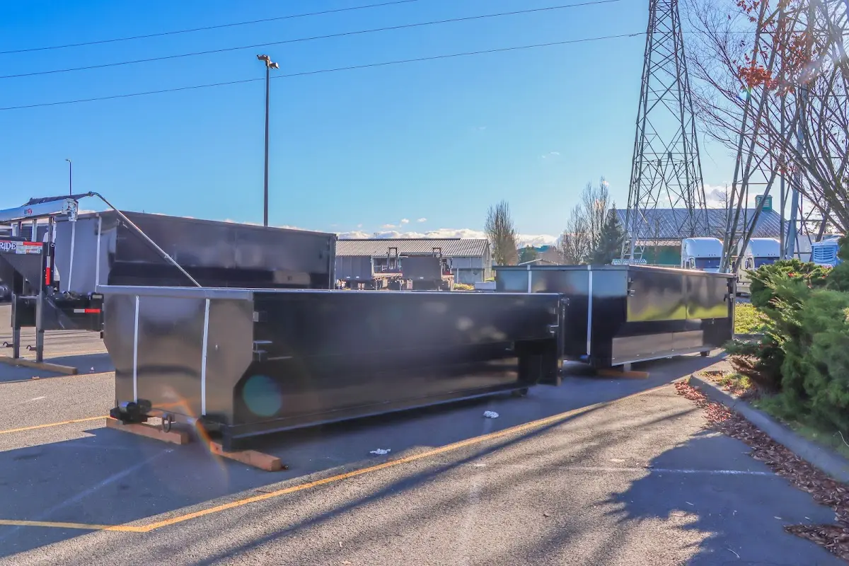 Roll-off dumpster ready for waste disposal at job site for Construction Dumpster Rental in East Marlborough